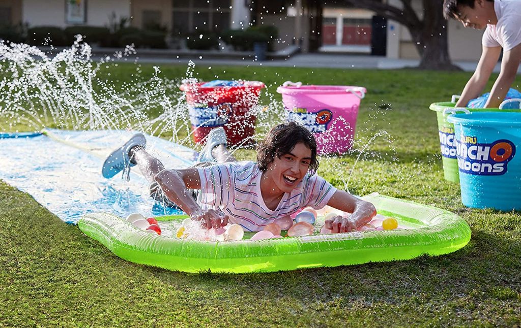 slip n slide with bunch o balloons